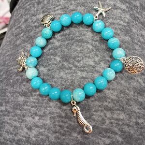 Hand Crafted Dyed Quartz With Ocean Craetures Charm Stretched Bracelet